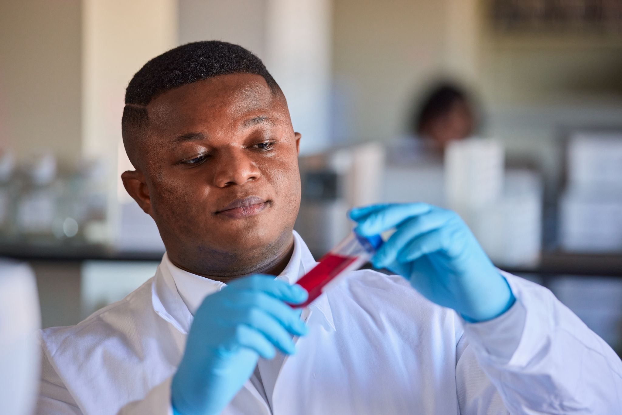Researcher pipetting